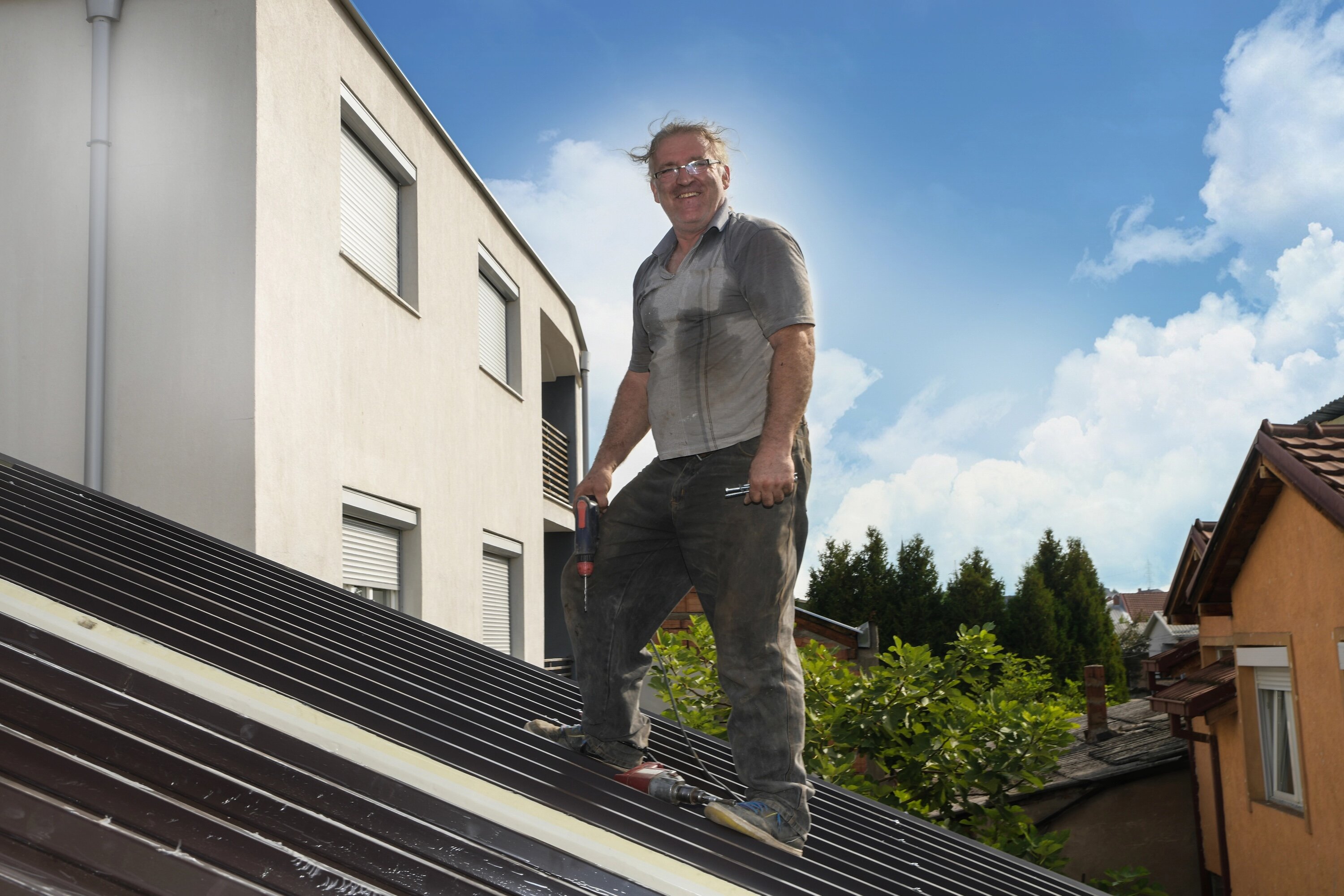 [company] roofing crew member