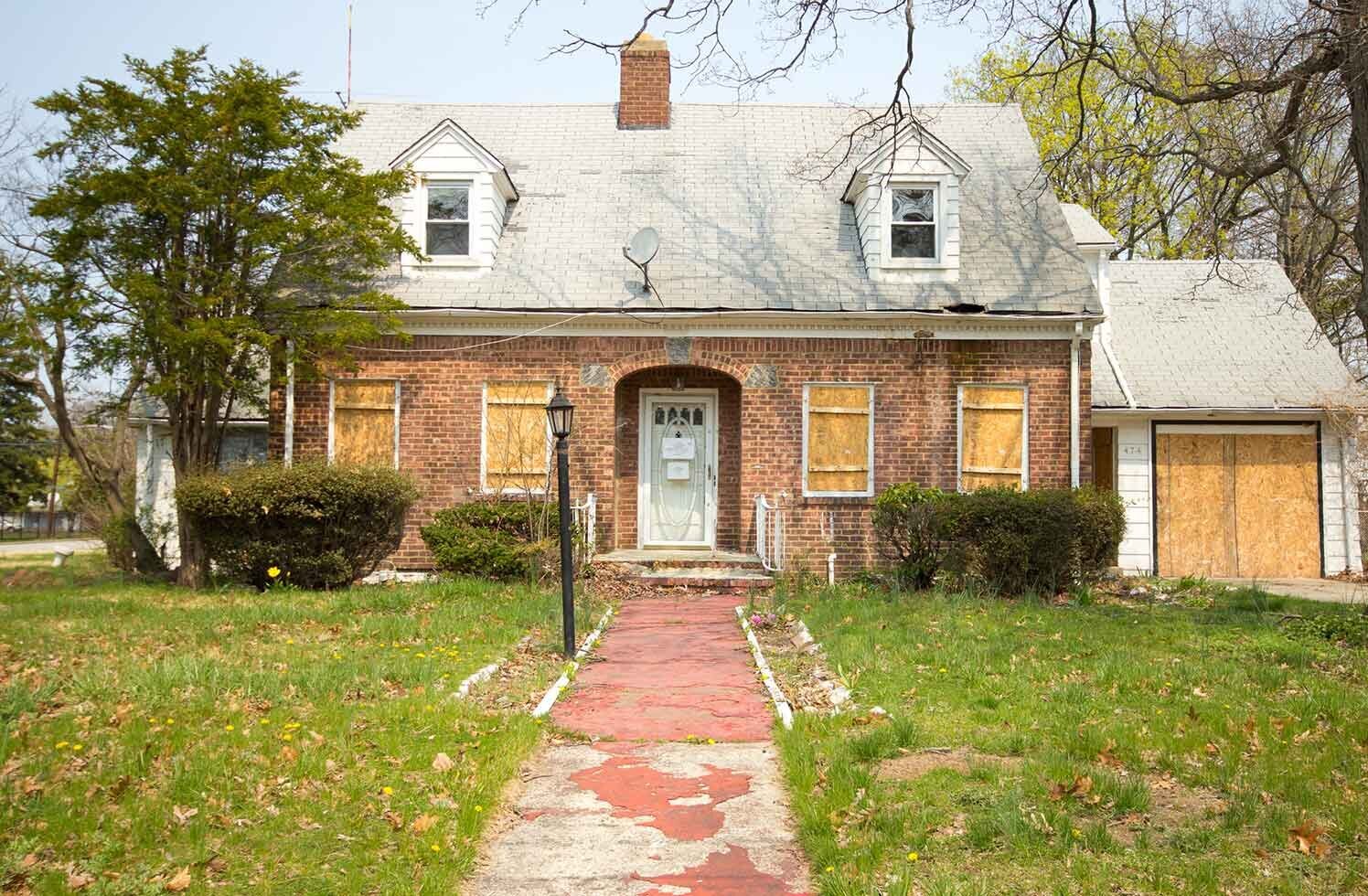 rundown-brick-house