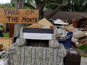 Flooded House with Yard of Month sign!