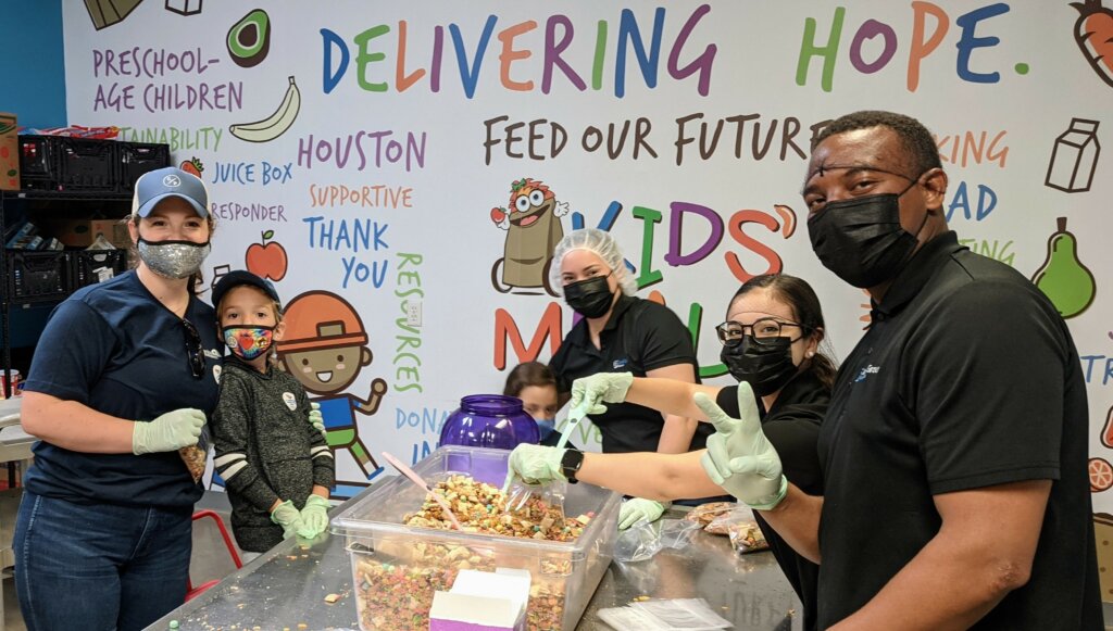 volunteers serving food