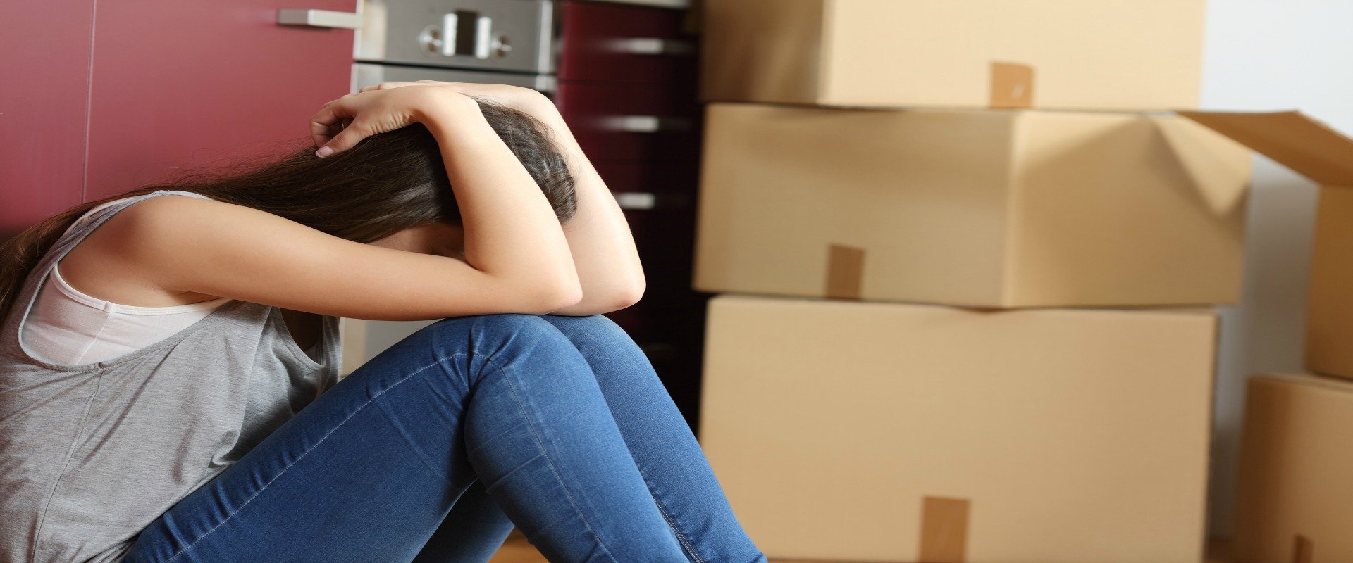 Sad evicted woman worried moving house