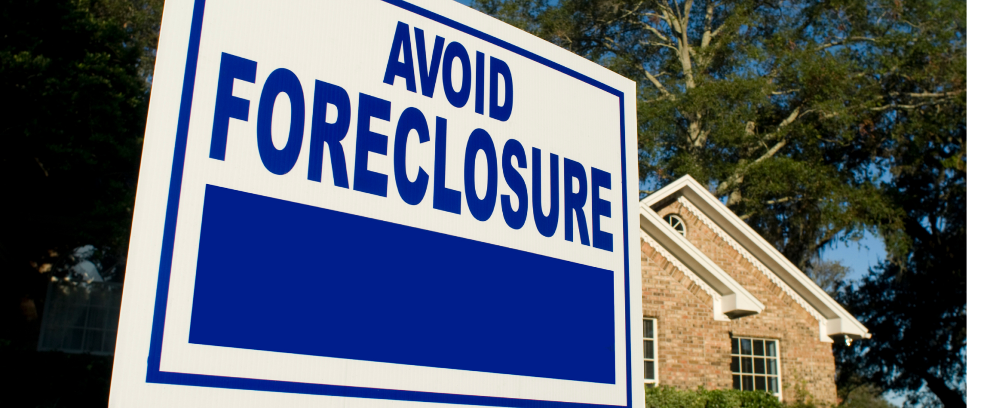 Blue sign that reads avoid foreclosure.