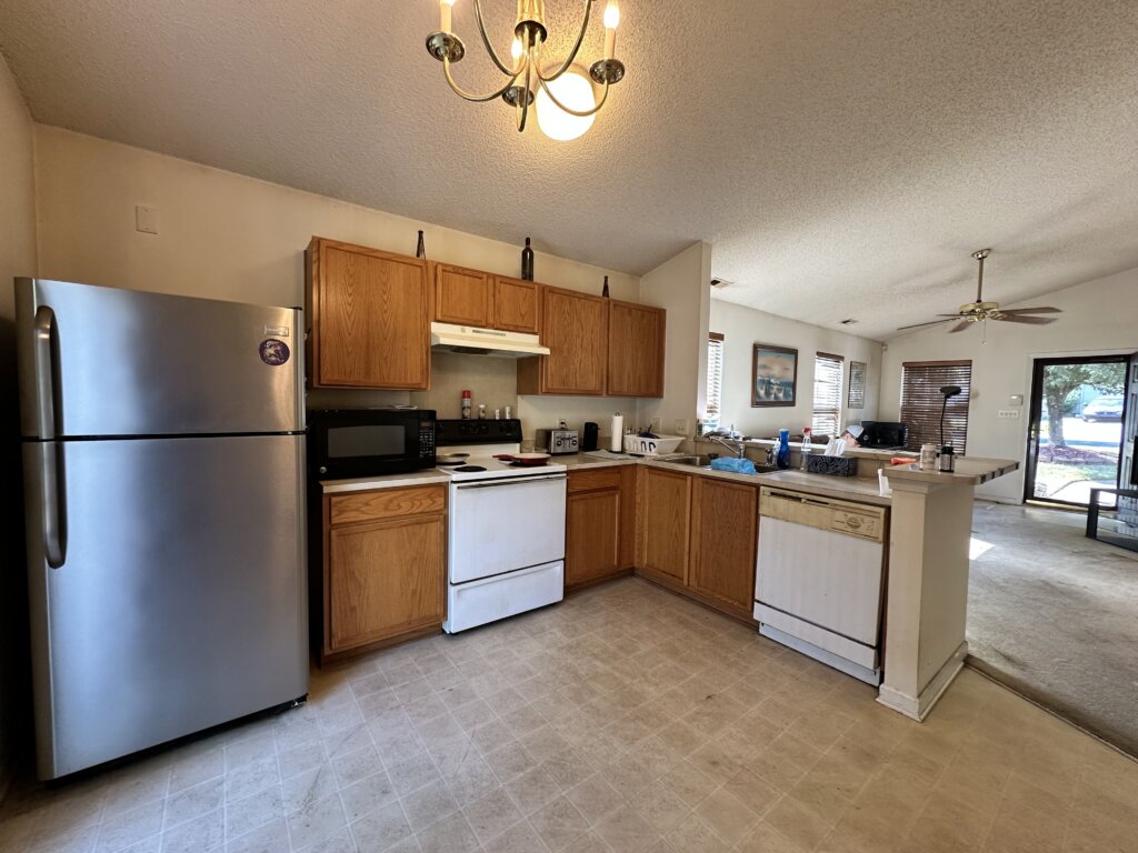 Clean as-is kitchen in a Concord, North Carolina home prepared for buyers interested in a cash or investor purchase