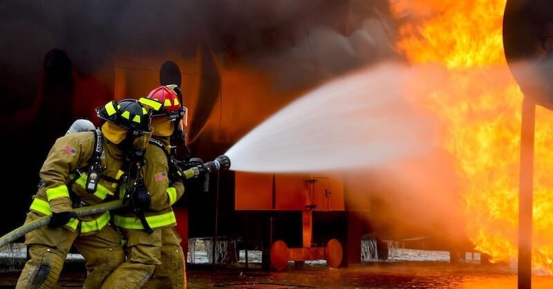 Memphis fire fighters putting out a house fire