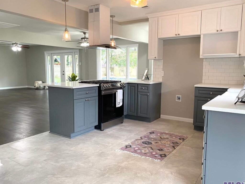 We buy houses in Louisiana. A beautifully renovated Baton Rouge home after a flip, with fresh paint, new landscaping, and modern updates, showing a complete transformation.