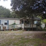 A photo of a house we just purchased in Paisley, FL. Sell my house fast in Paisley, FL.