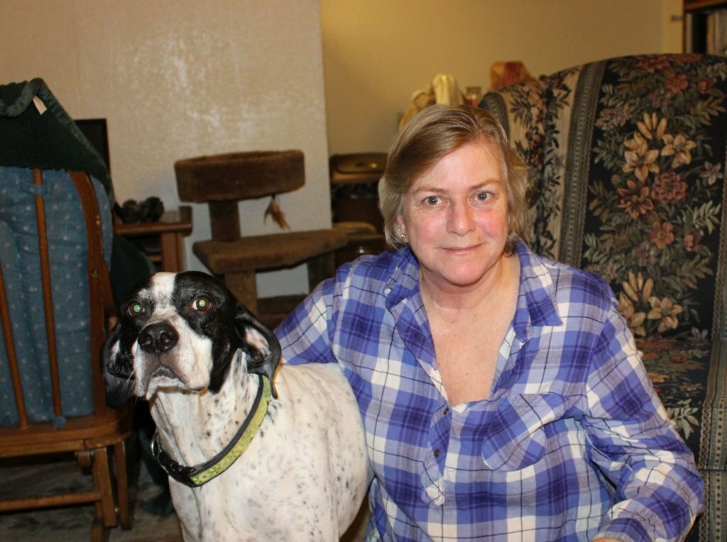 Donna with a dog in a house wants to stop foreclosure