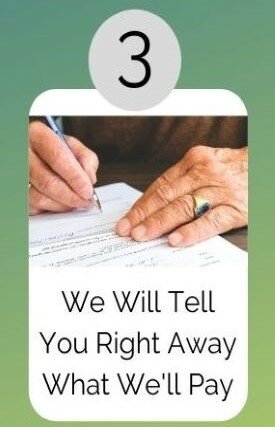 Man writing offer on house
