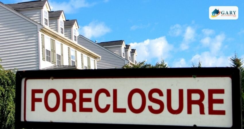 The foreclosure moratorium is over-bank foreclosure sign and a house.