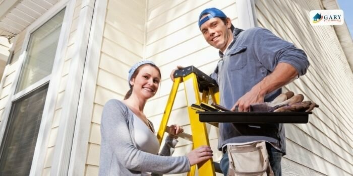 The home-owner is having her house repaired.