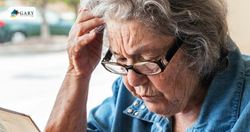 Elderly woman with dementia reading something