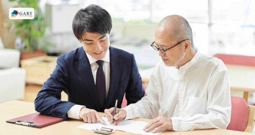 Home owner signing some papers-selling his house to an investor
