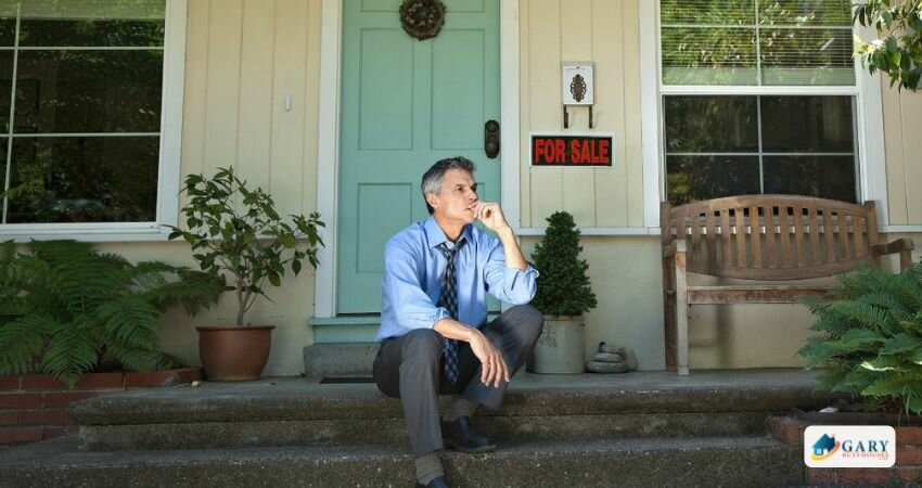 A man looking sad with his estate sale.