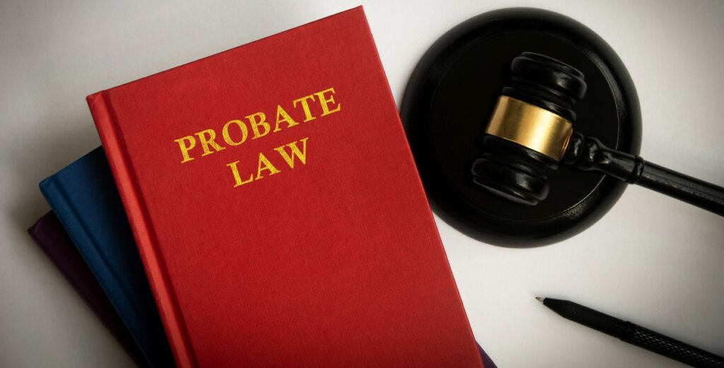 Top view of probate law book with gavel on white background. Law concept on probate in Utah.