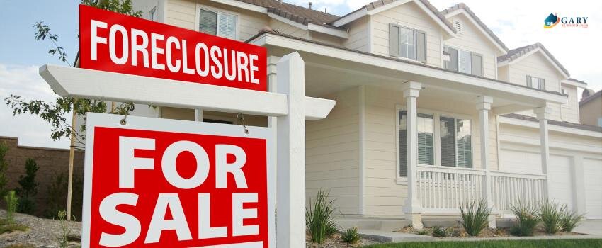 A Utah house with a foreclosure sale sign in front yard.