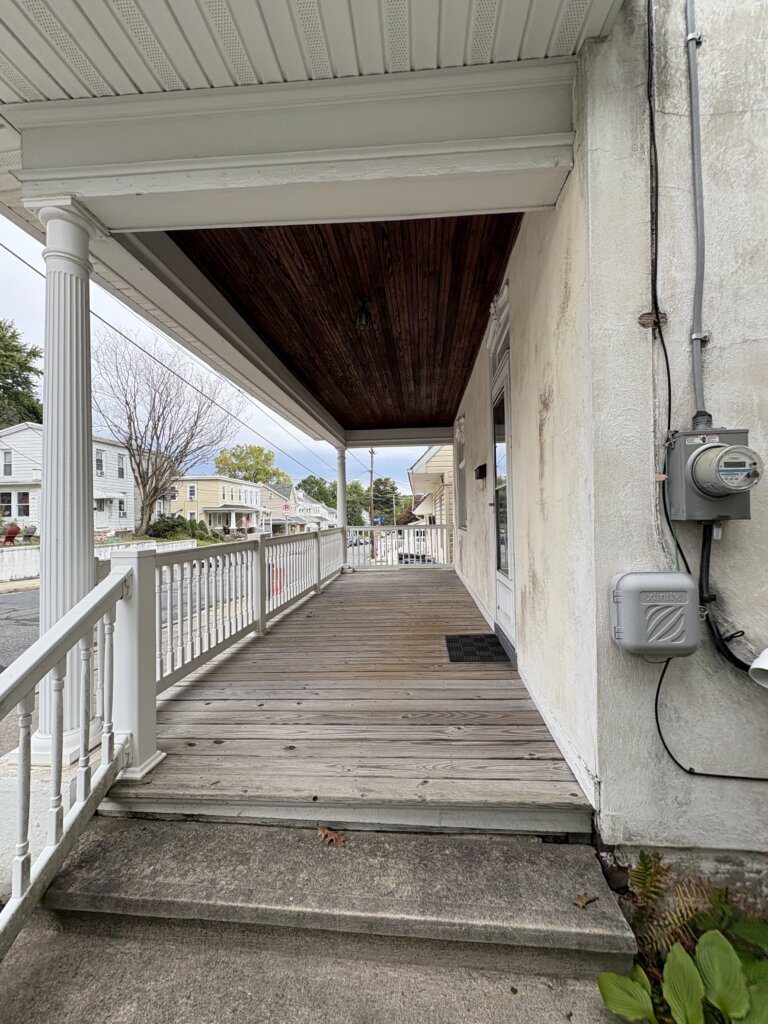 Exterior view of a long-time family home in Berks County Pennsylvania sold as-is through a cash home sale, showing a property needing updates before transfer.