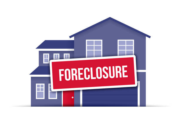picture of house with foreclosure sign in front