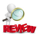 Person holding a magnifying glass as to signify reviewing something