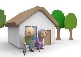 old couple in front of a house