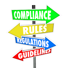 A sign listing "compliance, rules, regulations and Guidelines"