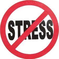 A sign with the word "stress" written on it, then crossed out to signify "Stress Free"