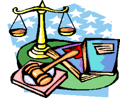 Picture of a gavel, law scale and books referring to the local laws