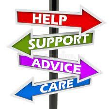 A pole with signs on it that read "help, support, advice and care"