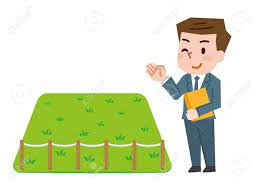 looks like a real estate agent standing next to some grass referencing the land for sale market