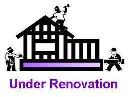 image of a house under renovations with workers using tools