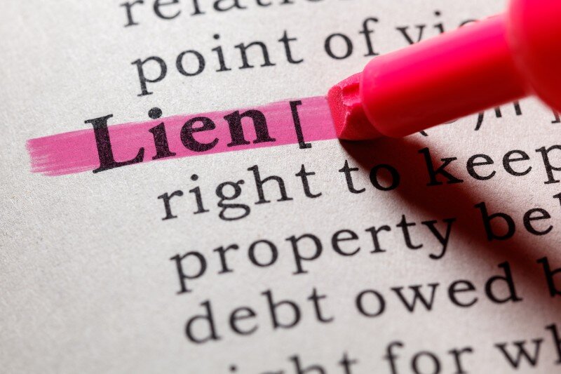 A homeowner looks for the definition of a lien. 