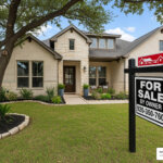 For Sale By Owner sign in front of San Antonio home - how to sell a house by owner
