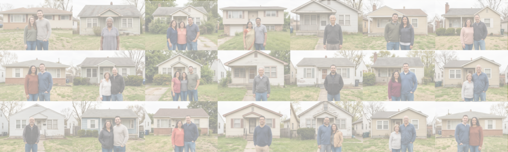 Happy homeowners standing in front of their homes