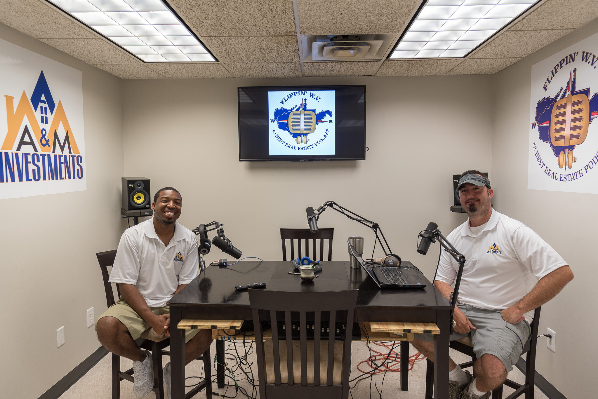 Steve Coyne and Andrew McDavid, owners of AM Investments, in their podcast studio