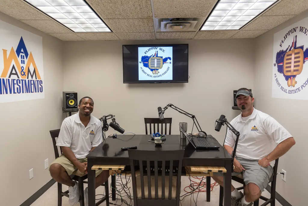 Steve Coyne and Andrew McDavid, owners of AM Investments, in their podcast studio