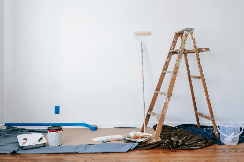 paint and ladder on floor