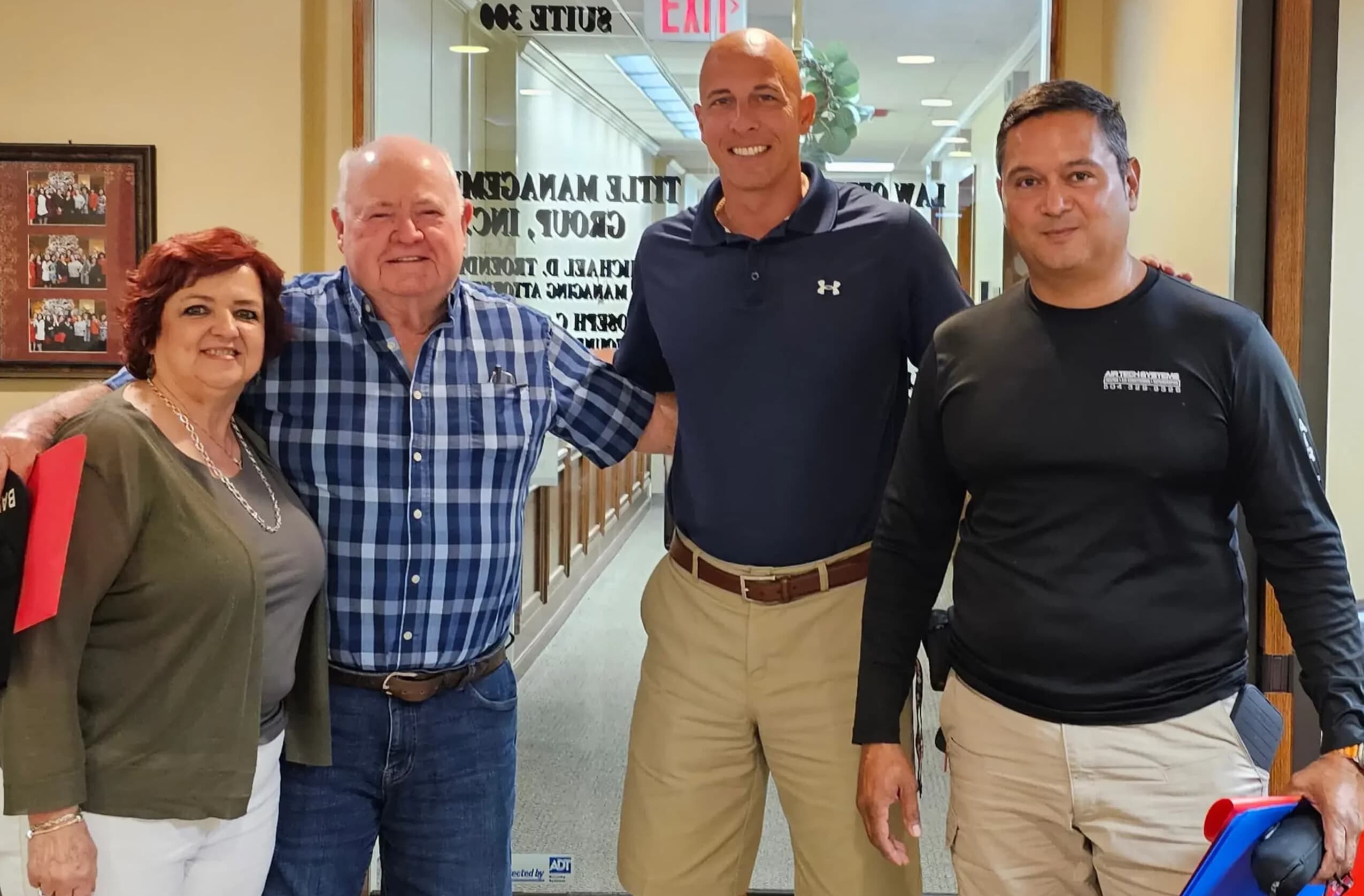 New Orleans house seller smiling at closing after cash deal with NOLA Buys Houses
