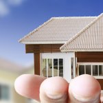 Person holding a home