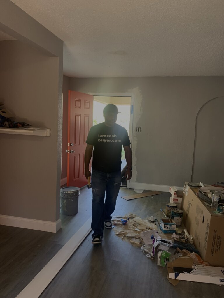 rod hanks walking in house in need of repairs