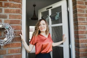 Woman walking out of New Jersey house