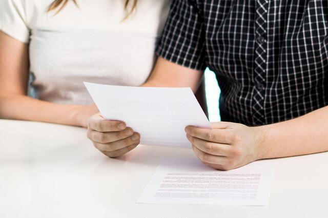 California family reviewing a document
