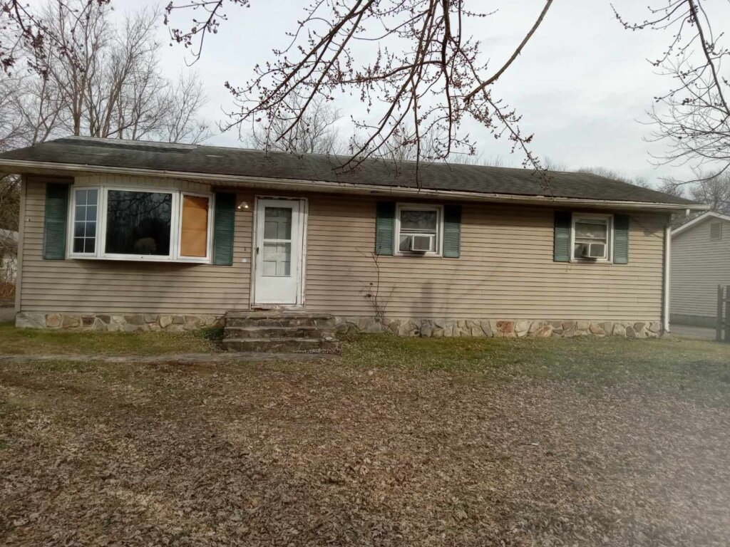 Front of a home that we bought with cash in New York state.