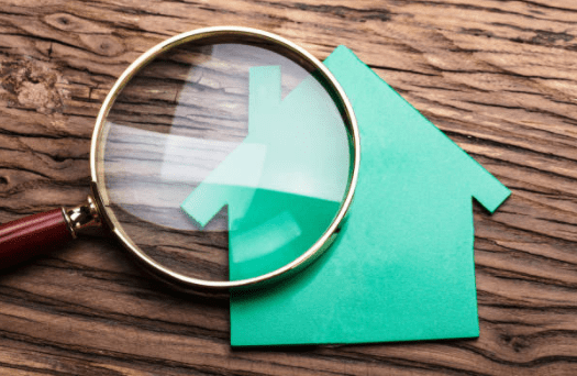 Appraise my house - Magnifying glass and a paper house