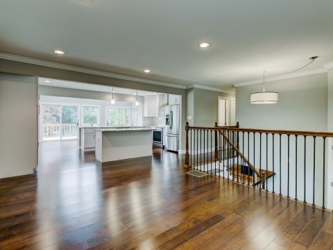 We used a support beam to create an open concept main floor at 625 Edwards Rd