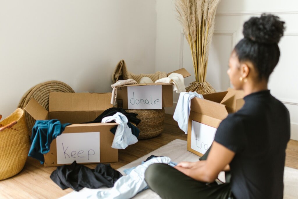Woman sorting her belongings.