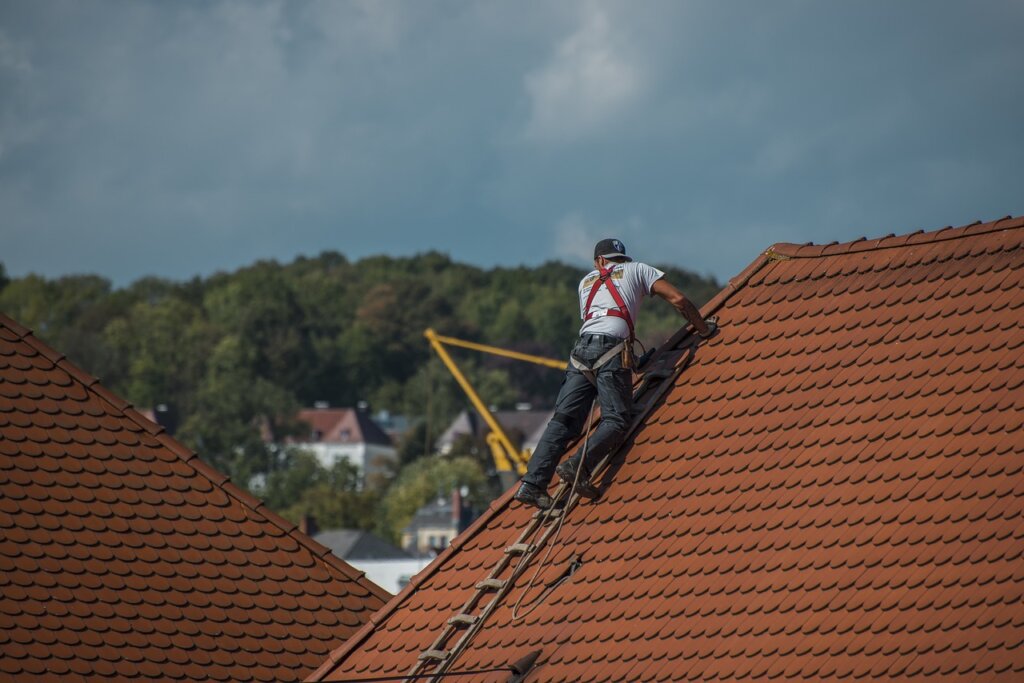 A man repairing a roof.