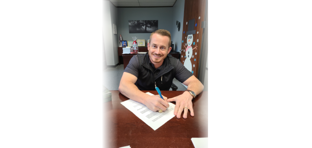 Signing we buy houses documents