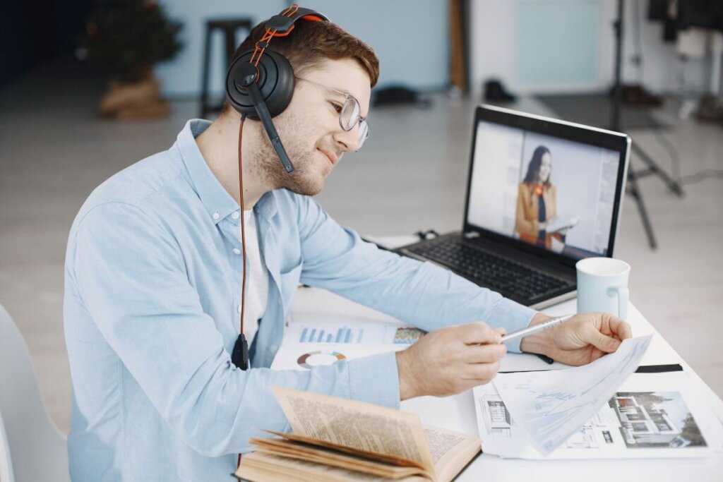 Man reviewing documents during a remote California mortgage note closing