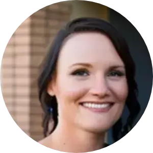 Happy home seller Tina taking selfie in front of her Queen Creek, AZ house with We Buy Houses Arizona