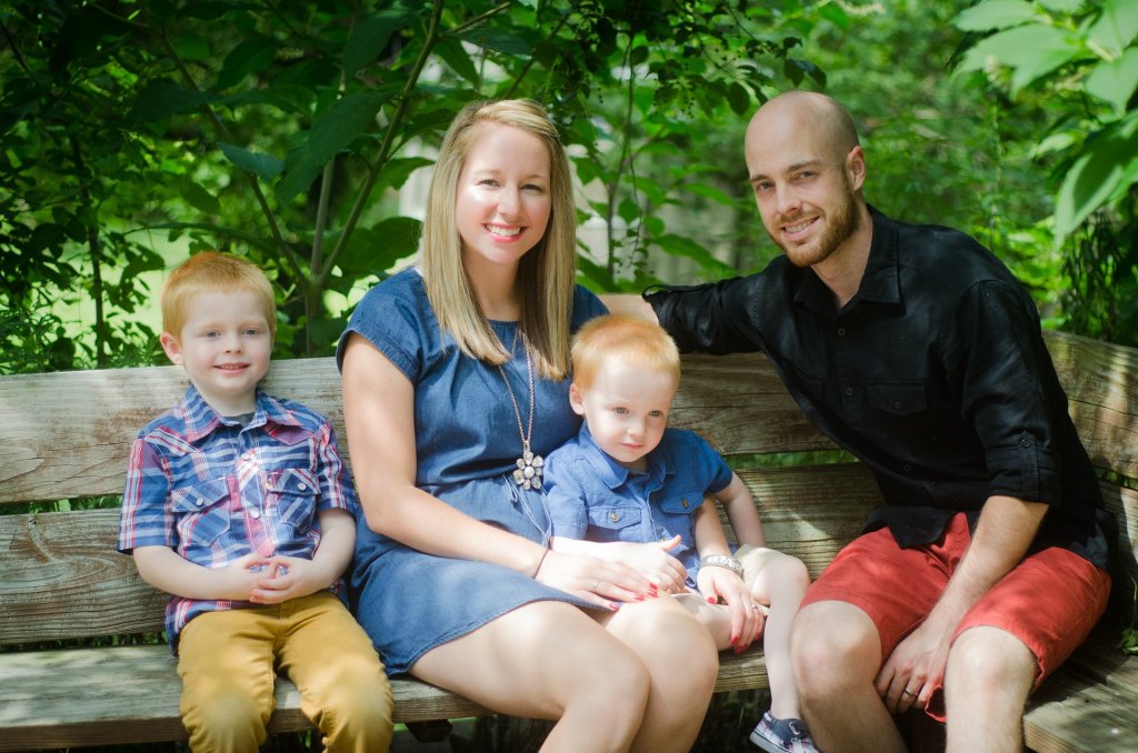 Young family on bench