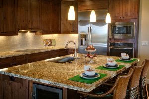 home for sale - floresville - kitchen bar set for dinner